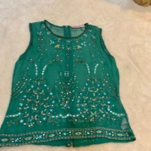 Calypso sheer green top with sequins S. Back zip.